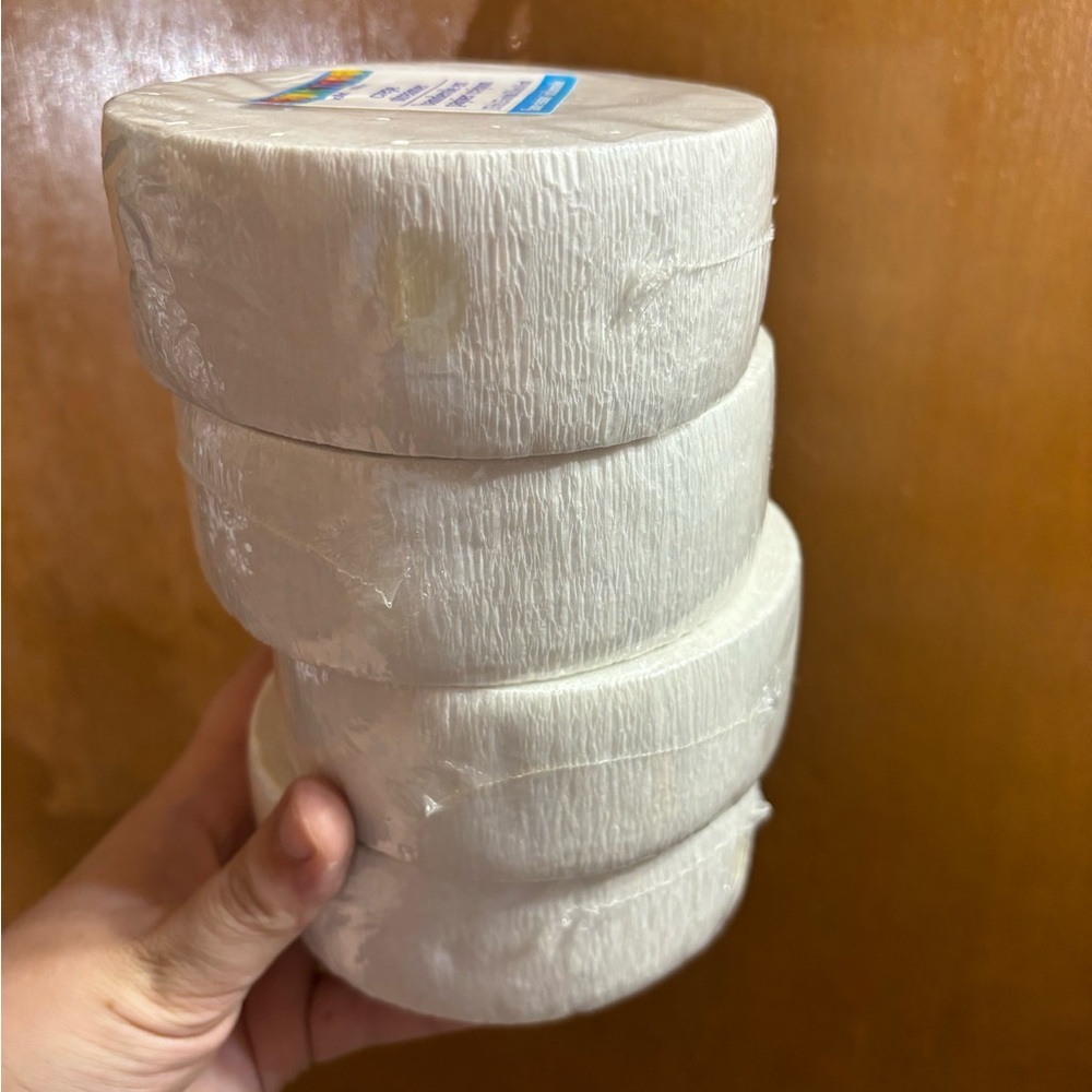 (set of FOUR) White Crepe Paper Rolls